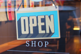 open sign in storefront window