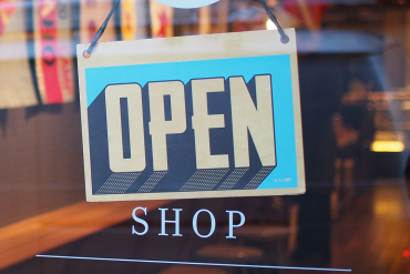 open sign in storefront window