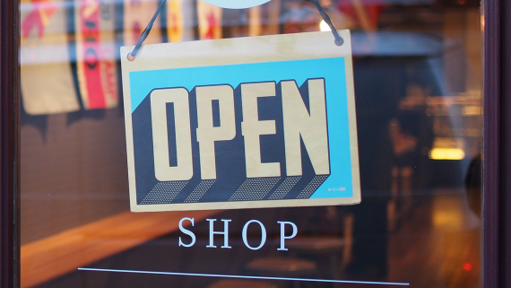 open sign in storefront window